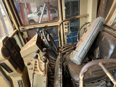 LOTE 001 - MOTONIVELADORA CATTERPILLAR 135H